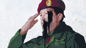 hugo chavez mural manchado